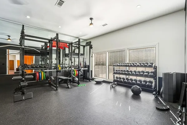 a view of a room with gym equipment