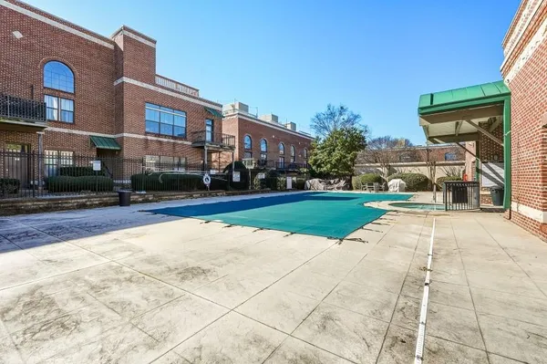 a view of a building with a yard