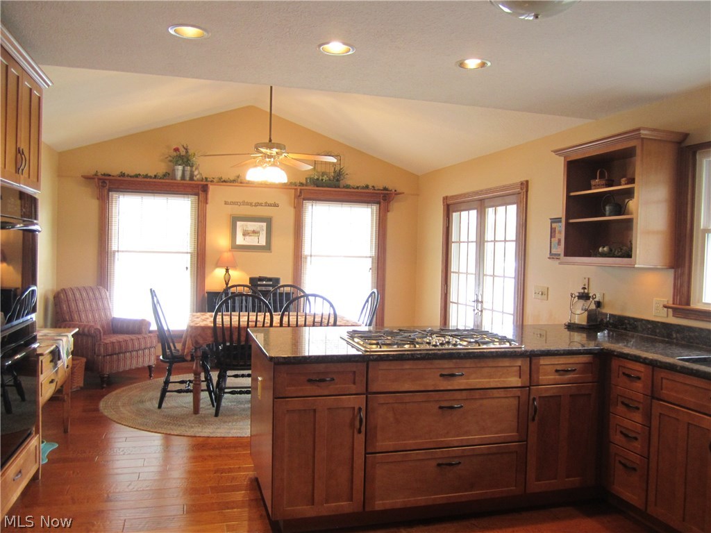 4834 Camp Road Rootstown, OH 44272 - Photo 1 of 22 French doors lead to screened three season room and deck.
