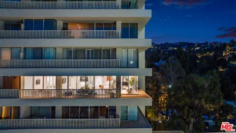 a view of a house with roof deck
