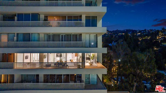 a view of a house with roof deck