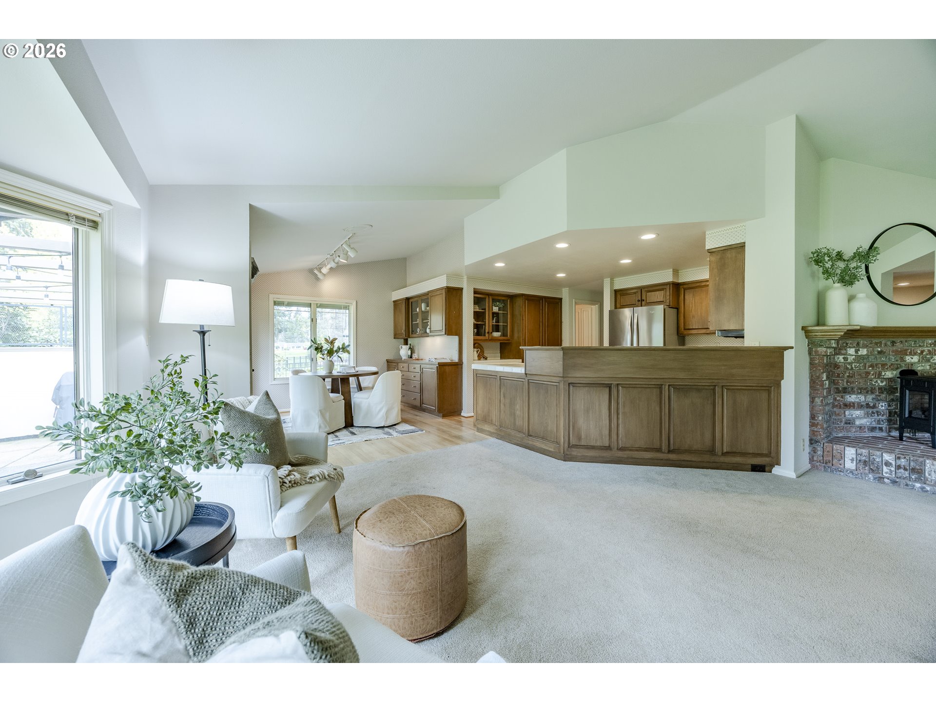 982 Shaughnessy Lane Eugene, OR 97401 - Photo 11 of 48 a living room with furniture and a large window