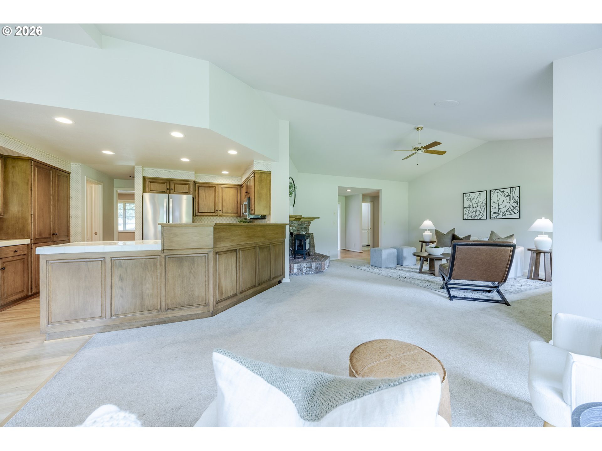 982 Shaughnessy Lane Eugene, OR 97401 - Photo 12 of 48 a living room with furniture a kitchen view and a kitchen view