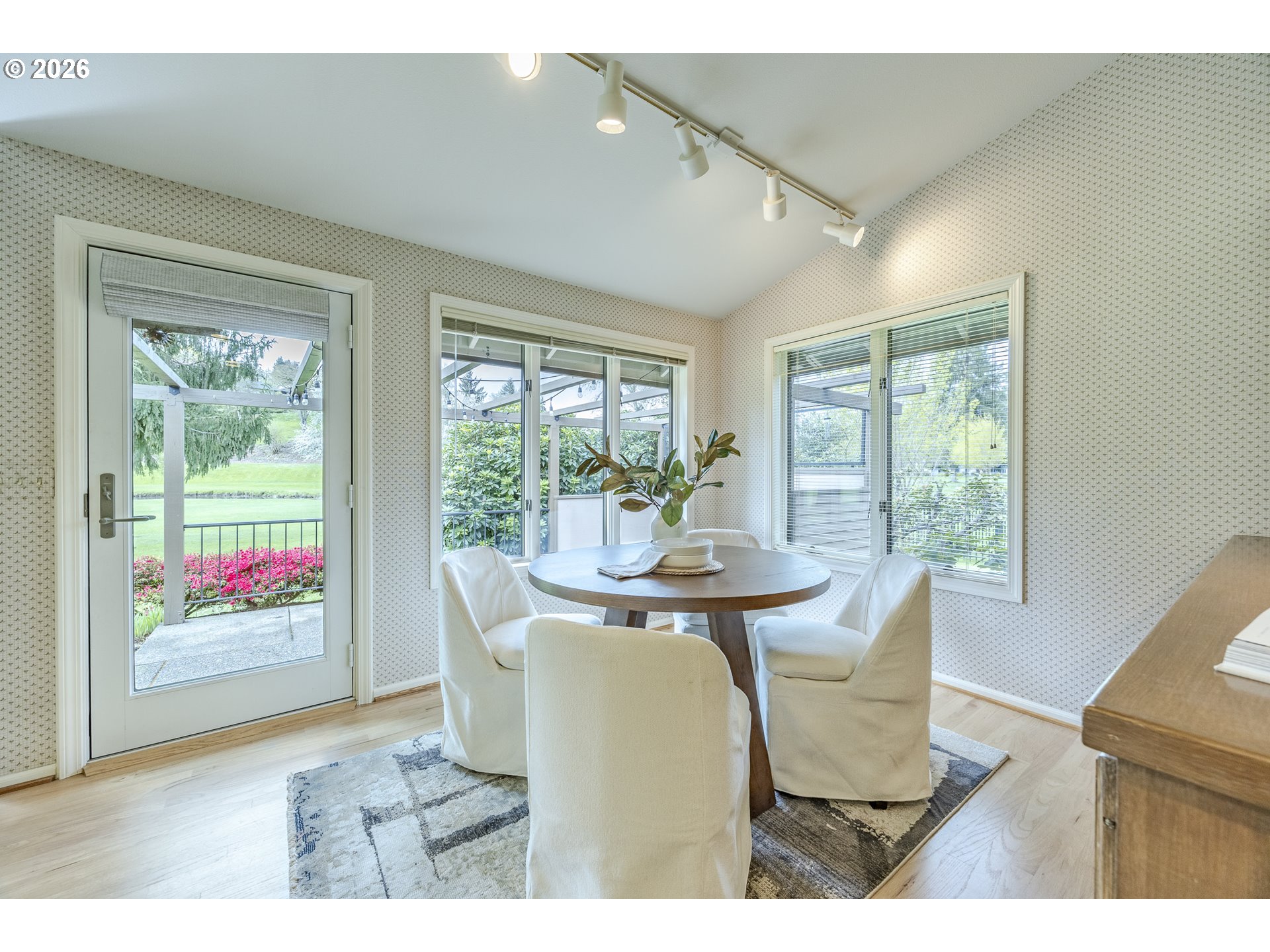 982 Shaughnessy Lane Eugene, OR 97401 - Photo 15 of 48 a dining room with furniture and wooden floor