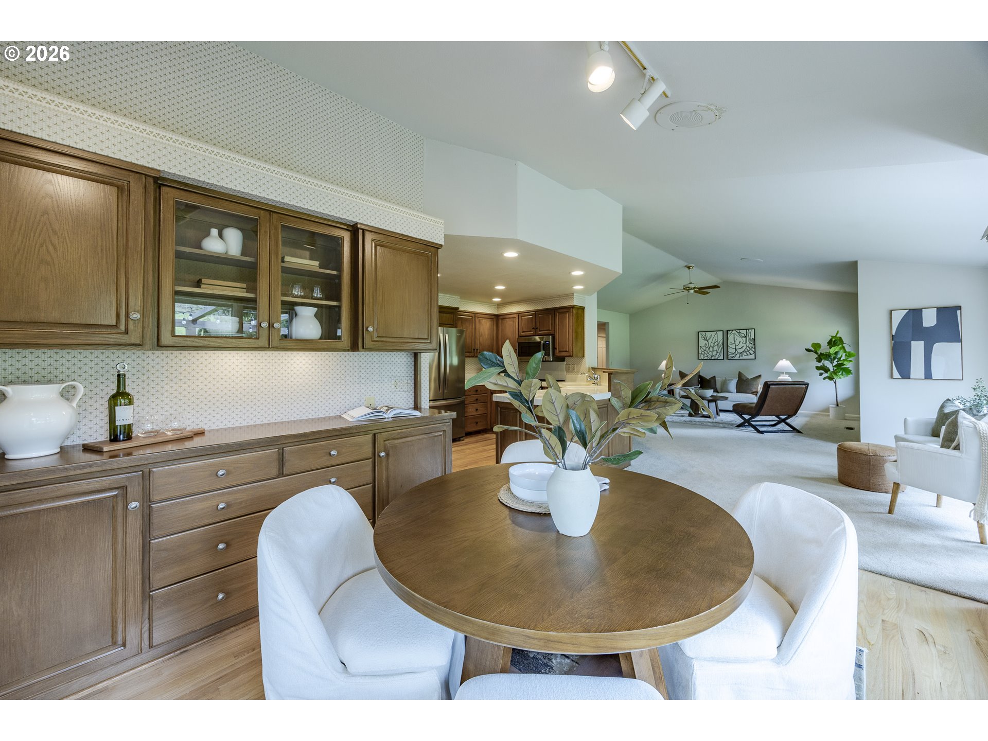 982 Shaughnessy Lane Eugene, OR 97401 - Photo 16 of 48 a kitchen with a dining table chairs and kitchen view