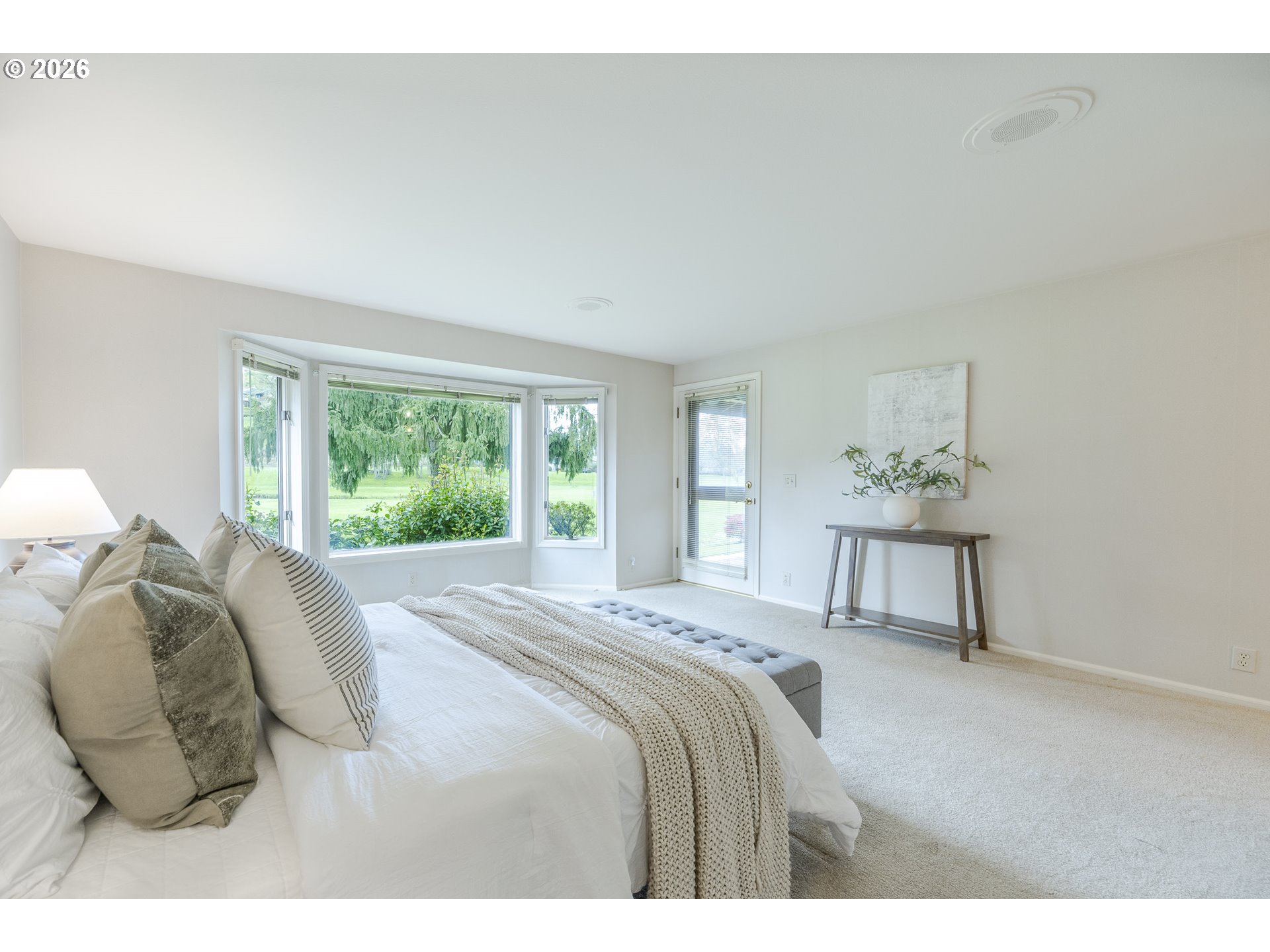 982 Shaughnessy Lane Eugene, OR 97401 - Photo 28 of 48 a bedroom with a bed and a chair