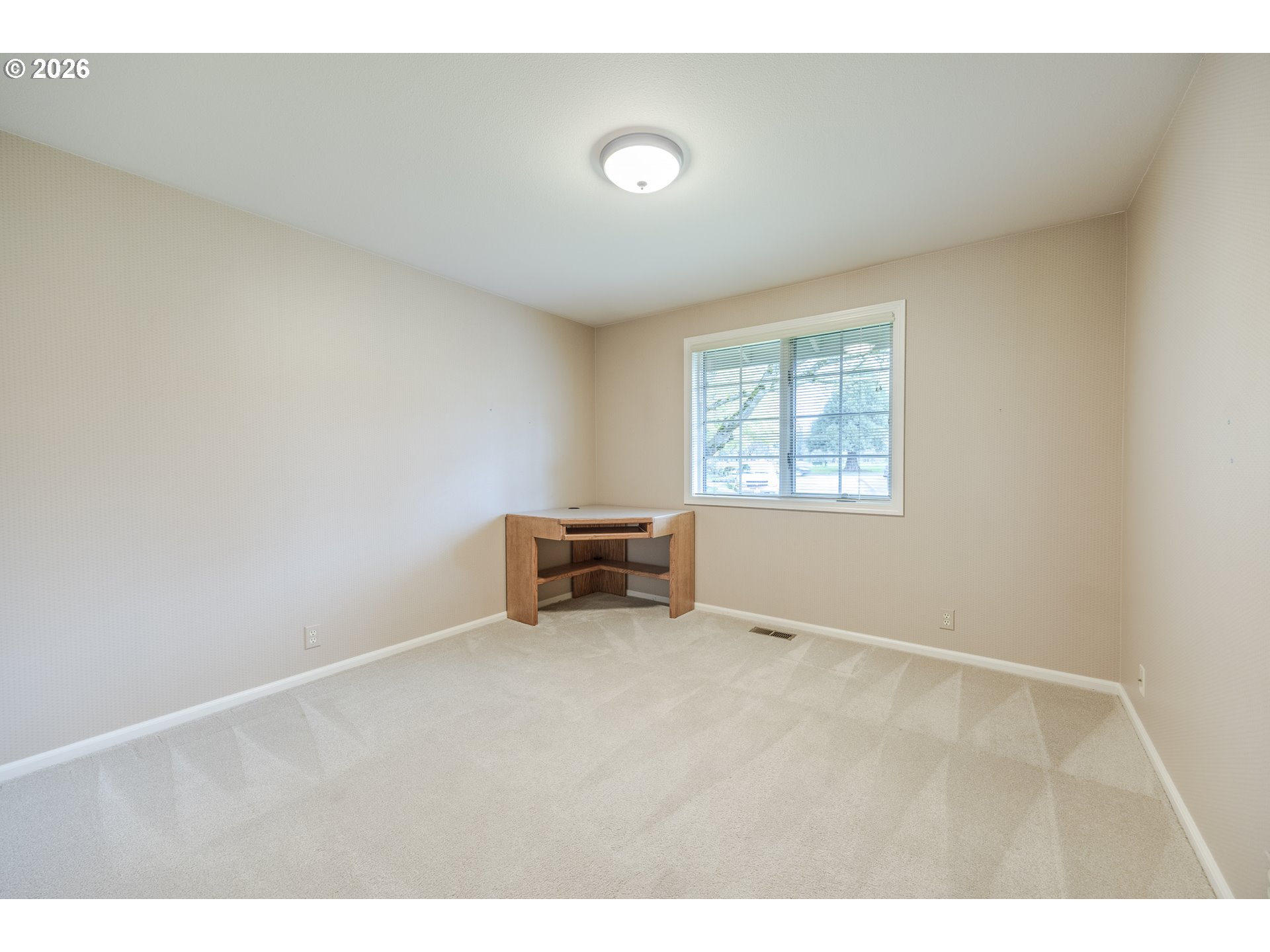 982 Shaughnessy Lane Eugene, OR 97401 - Photo 35 of 48 a view of an empty room with a window