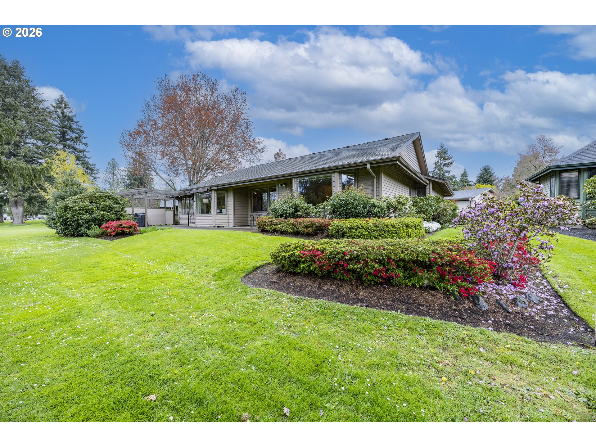 982 Shaughnessy Lane Eugene, OR 97401 - Photo 41 of 48 a view of a house with a big yard and potted plants