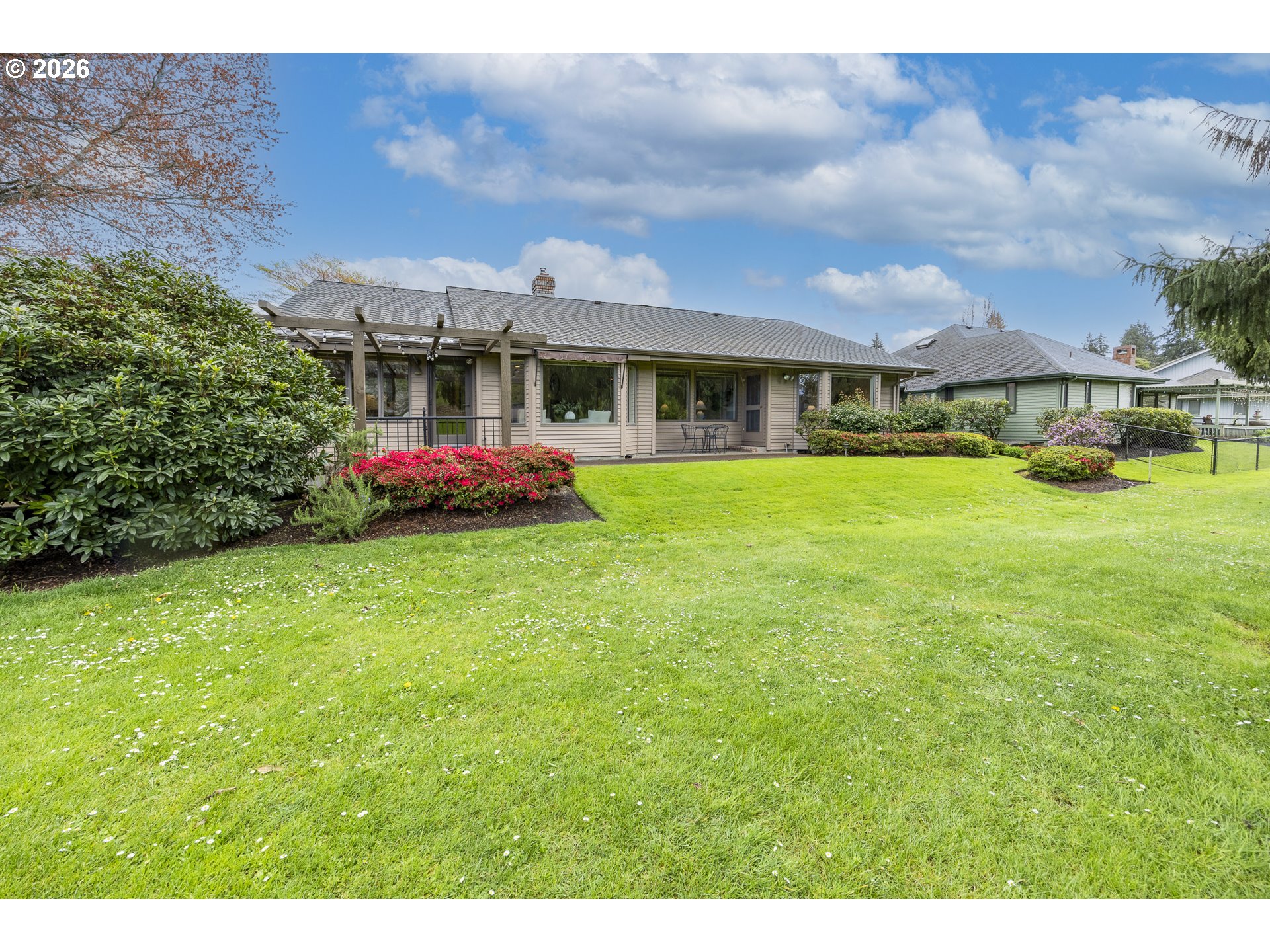 982 Shaughnessy Lane Eugene, OR 97401 - Photo 42 of 48 a view of a house with a big yard and potted plants