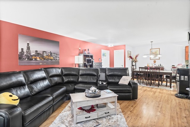4704 Euclid Avenue, Unit 1B Rolling Meadows, IL 60008 - Photo 4 of 20 a living room with furniture a rug and a table