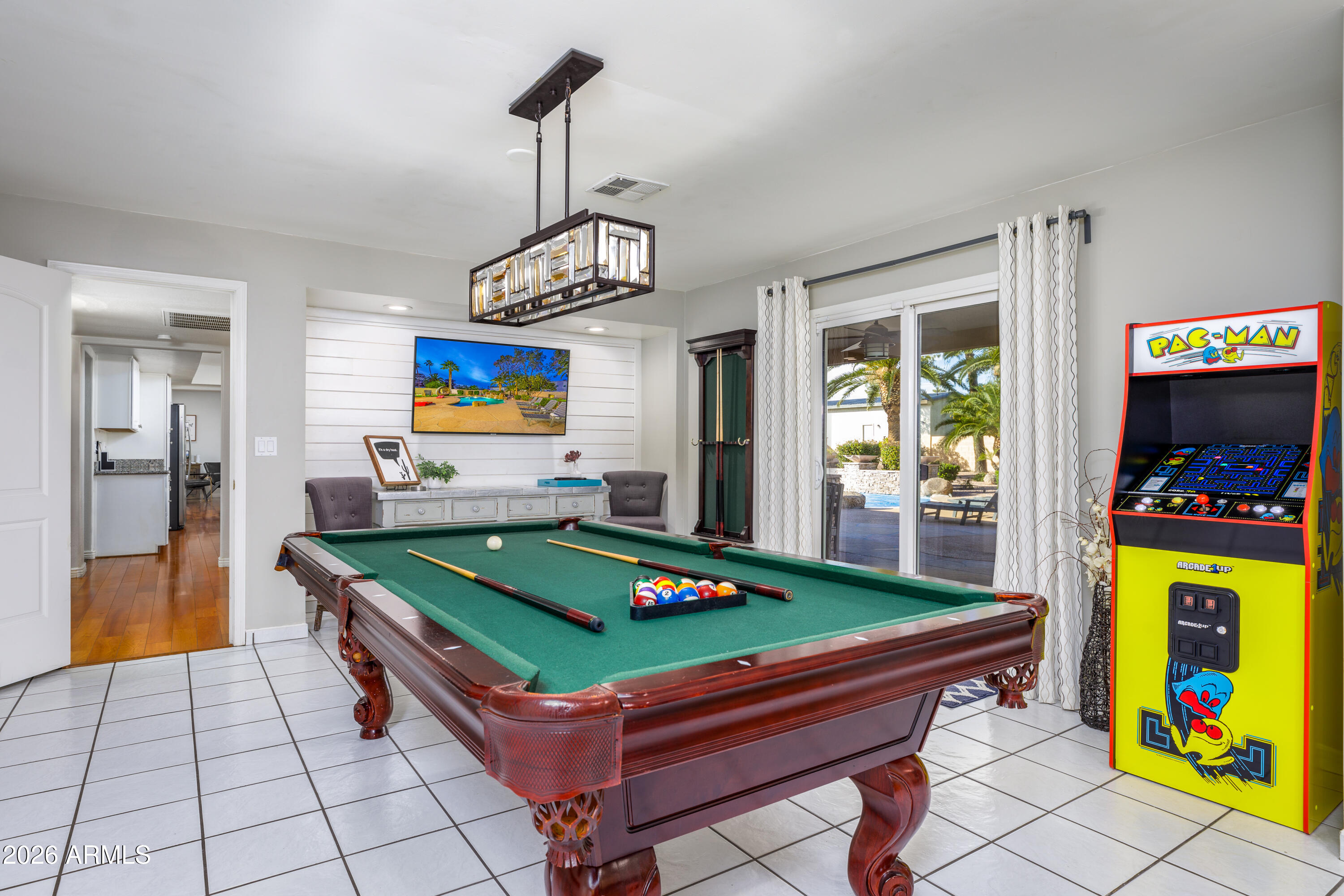 6932 East Presidio Road Scottsdale, AZ 85254 - Photo 23 of 30 a room with pool table and windows