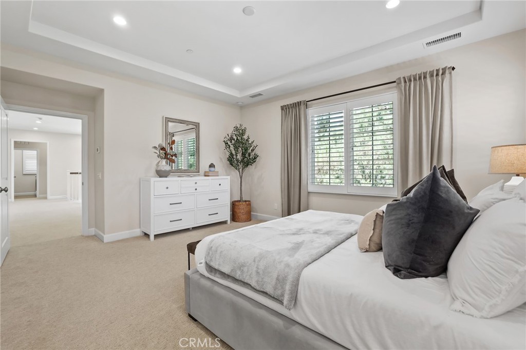 62 Wrangler Irvine, CA 92602 - Photo 34 of 61 a bedroom with a large bed and a window