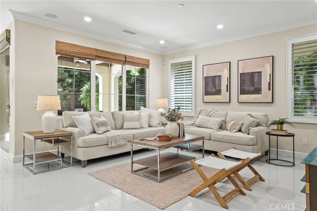 62 Wrangler Irvine, CA 92602 - Photo 8 of 61 a living room with furniture and large windows