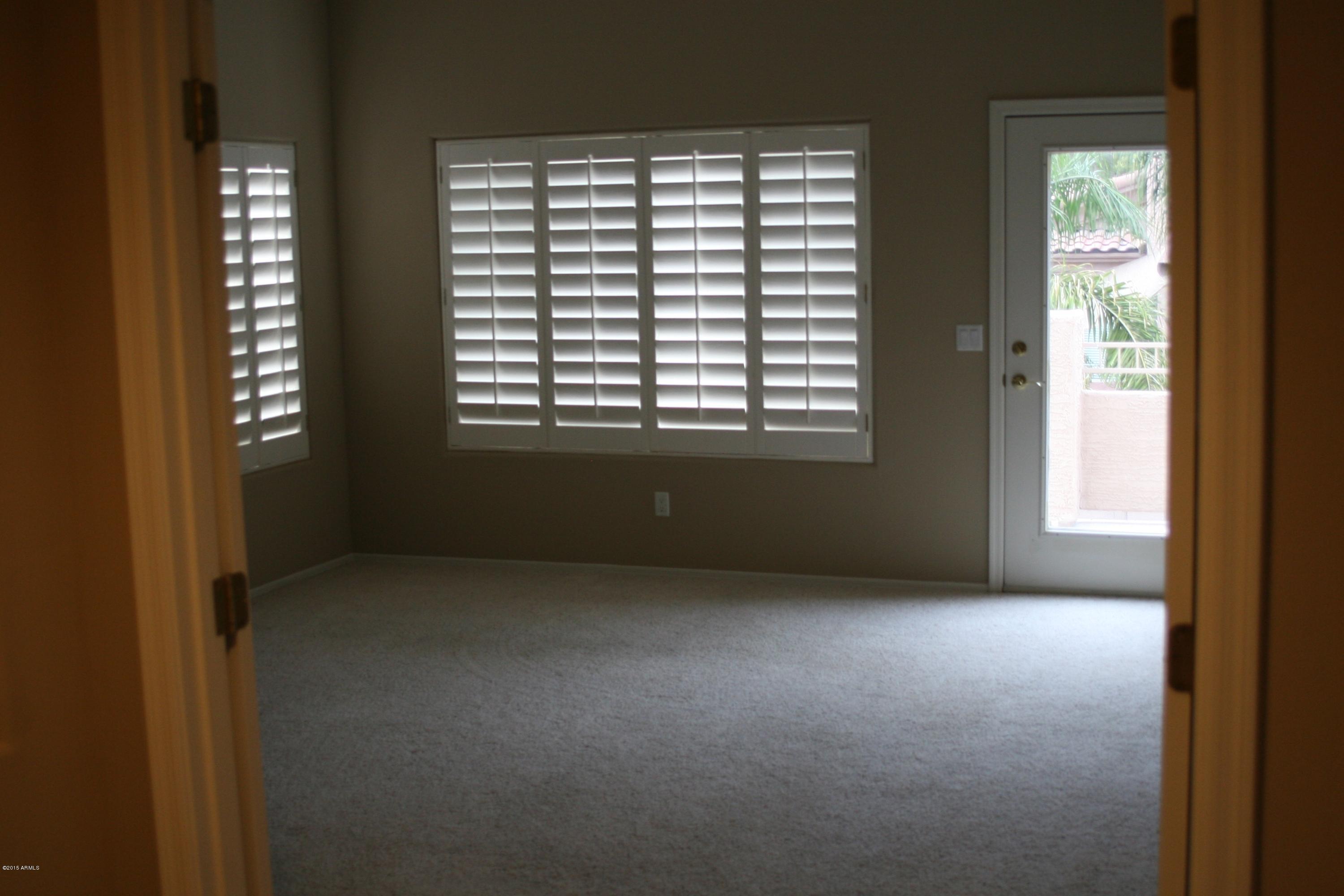 1932 East Marilyn Road Phoenix, AZ 85022 - Photo 26 of 34 Master Bedroom with door to upstairs dec