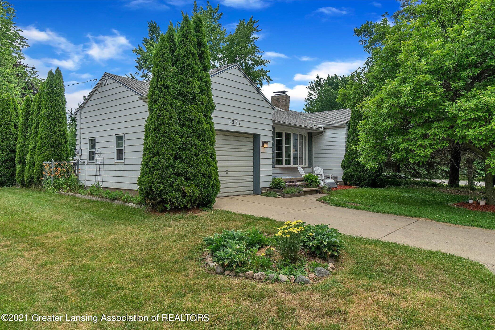 1354 West Webb Road Dewitt, MI 48820 - Photo 2 of 30 sideview