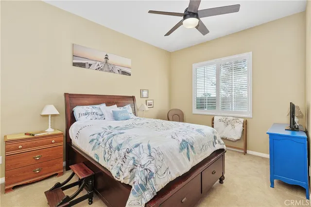 a bedroom with a bed and furniture