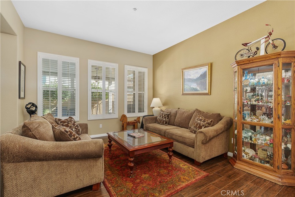 1195 Pamplona Drive Riverside, CA 92508 - Photo 4 of 39 The formal living room. Notice the wood shutters on the windows.