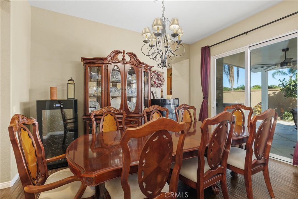1195 Pamplona Drive Riverside, CA 92508 - Photo 6 of 39 The dining room has a sliding door to the side covered patio. On this patio there is also an outdoor BBQ island.