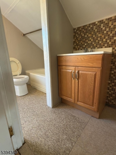 338 Union Avenue Irvington, NJ 07111 - Photo 3 of 8 a view of a bathroom with a sink and toilet