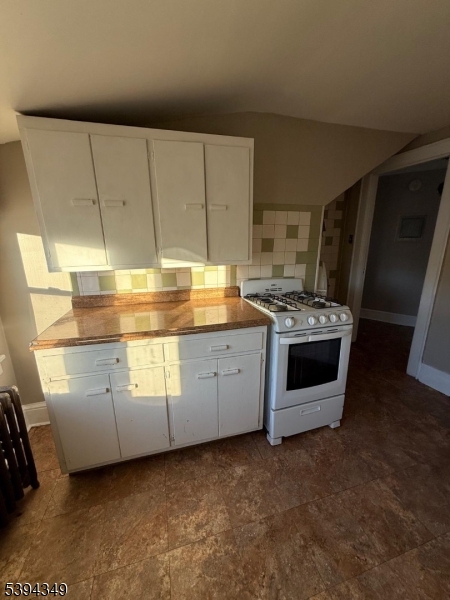 338 Union Avenue Irvington, NJ 07111 - Photo 5 of 8 a stove top oven sitting inside of a kitchen