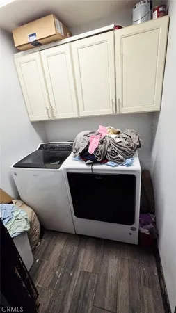 a stove top oven sitting inside of a kitchen
