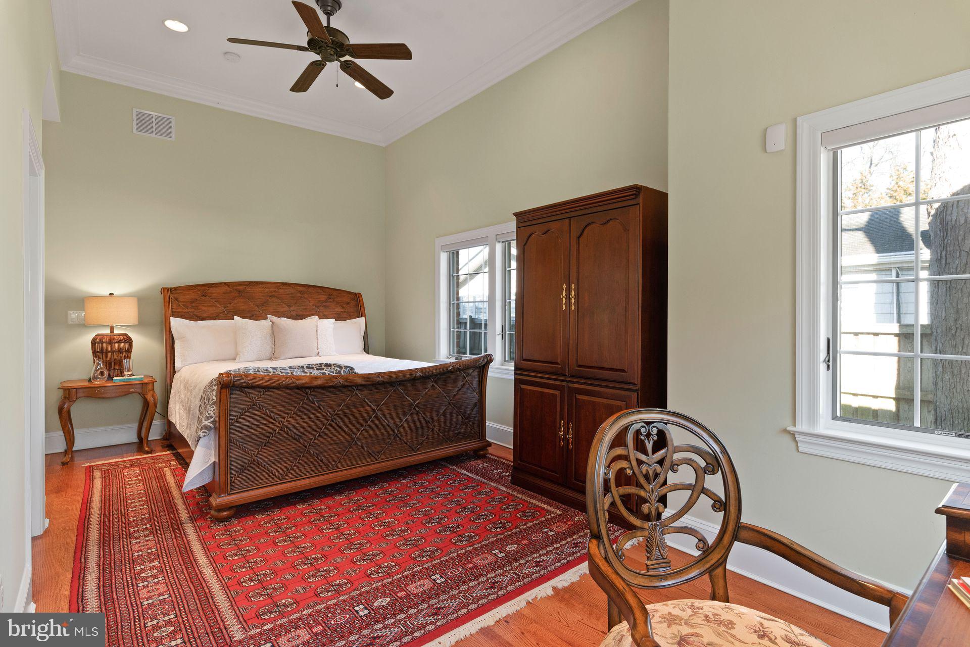 4132 Cadle Creek Road Edgewater, MD 21037 - Photo 36 of 85 a bedroom with a bed and a window