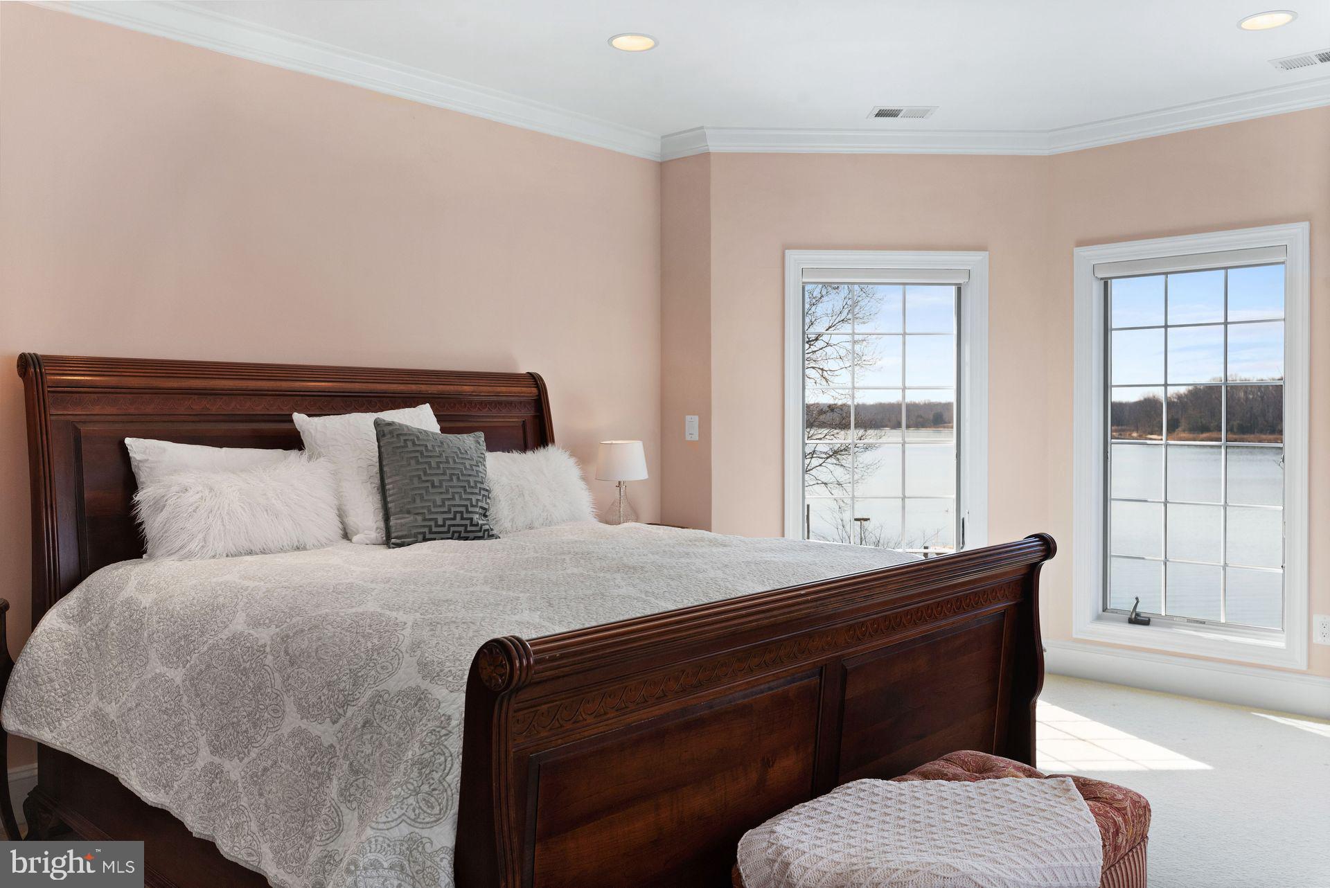 4132 Cadle Creek Road Edgewater, MD 21037 - Photo 40 of 85 a bedroom with a bed and window