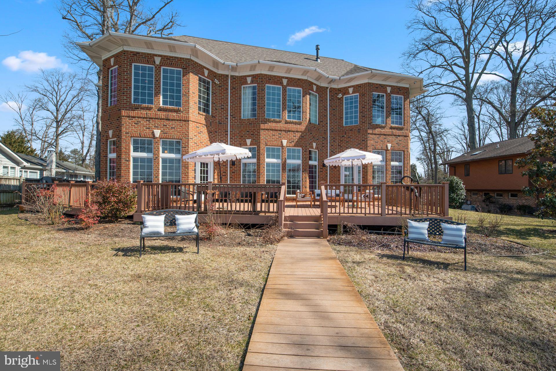 4132 Cadle Creek Road Edgewater, MD 21037 - Photo 72 of 85 a view of a house with backyard and sitting area
