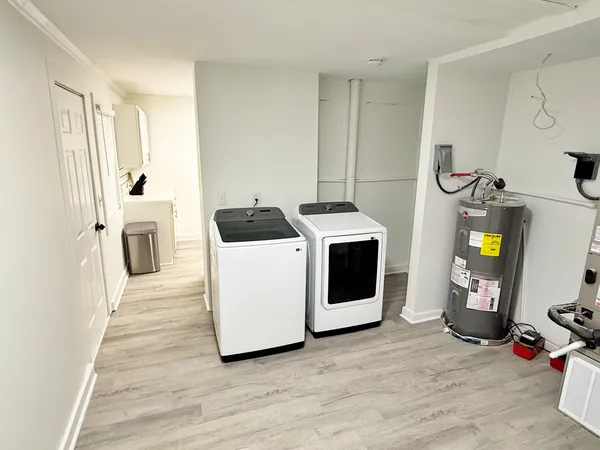 a view of an empty room with stairs
