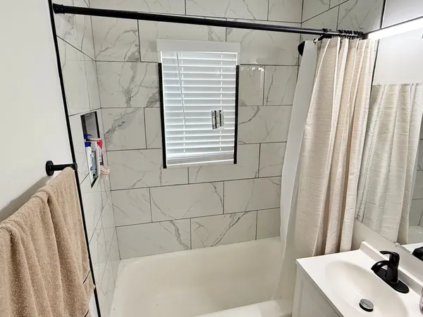 a view of a room with racks on the desk