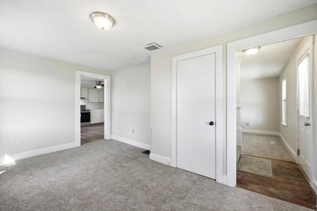 5096 Battlefield Road Harrisonburg, VA 22801 - Photo 16 of 38 an empty room with closet and windows