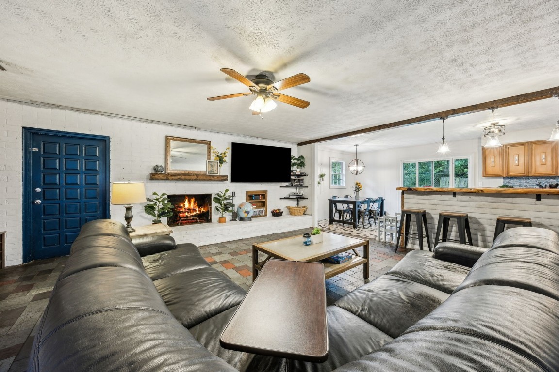 86071 Jones Road Yulee, FL 32097 - Photo 13 of 44 a living room with furniture and a flat screen tv