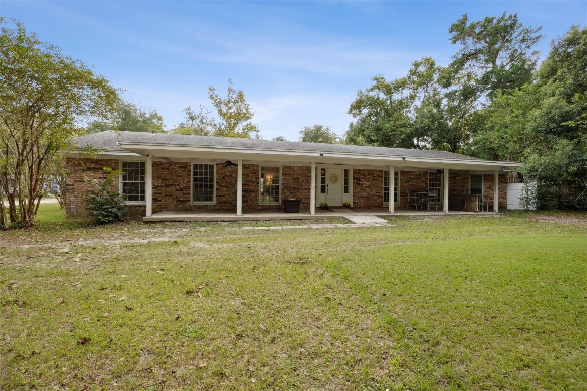 86071 Jones Road Yulee, FL 32097 - Photo 2 of 44 a view of a house with a garden