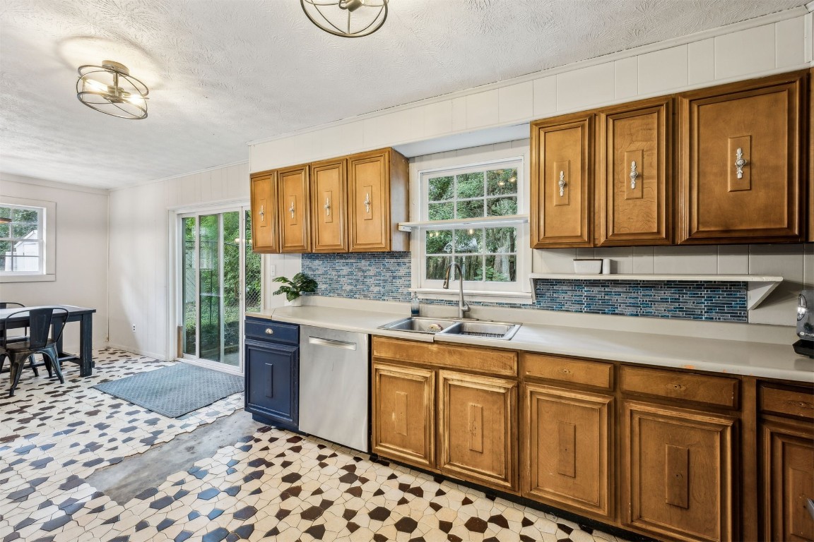 86071 Jones Road Yulee, FL 32097 - Photo 22 of 44 a kitchen with sink cabinets and window