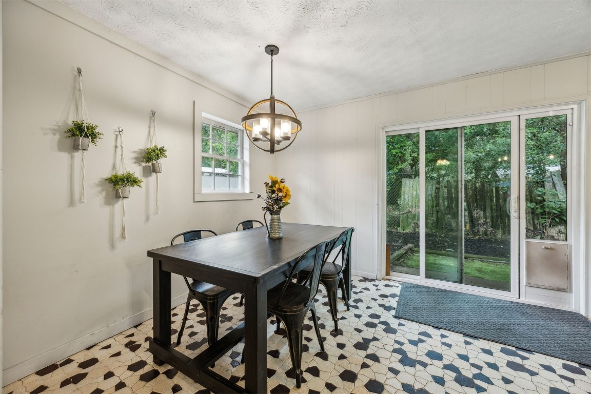 86071 Jones Road Yulee, FL 32097 - Photo 26 of 44 a view of a dining room with a table and chairs
