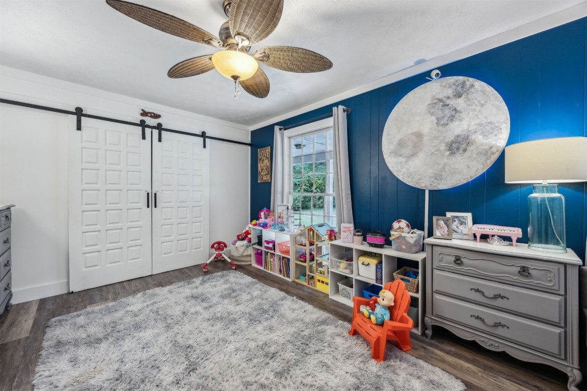 86071 Jones Road Yulee, FL 32097 - Photo 30 of 44 a room with toys and a chandelier