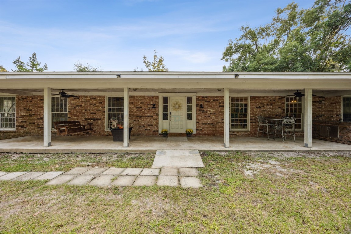 86071 Jones Road Yulee, FL 32097 - Photo 3 of 44 front view of a house with a porch