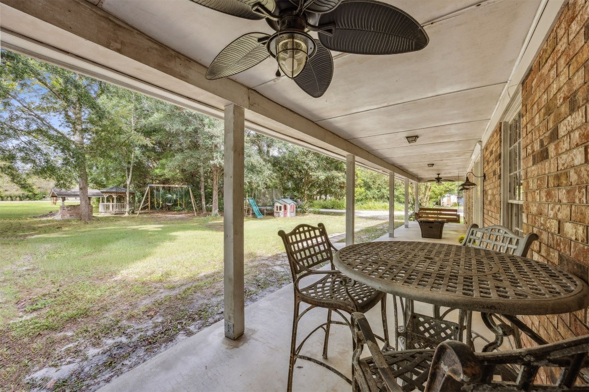 86071 Jones Road Yulee, FL 32097 - Photo 6 of 44 a view of a dining room with furniture window and outside view