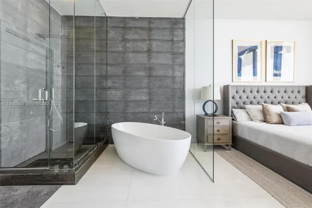 a bathroom with a bathtub and toilet
