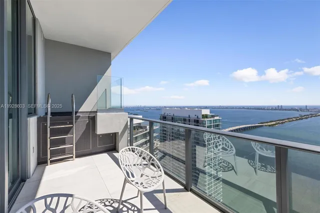 a view of balcony and furniture