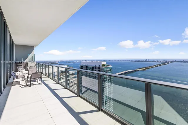 a view of balcony with furniture