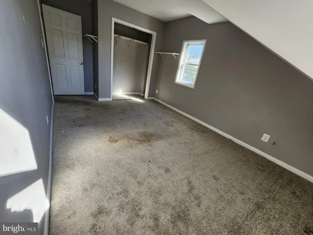 a bathroom with a sink a toilet and a shower