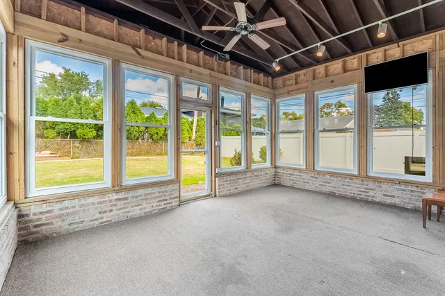 a view of an empty room with a balcony
