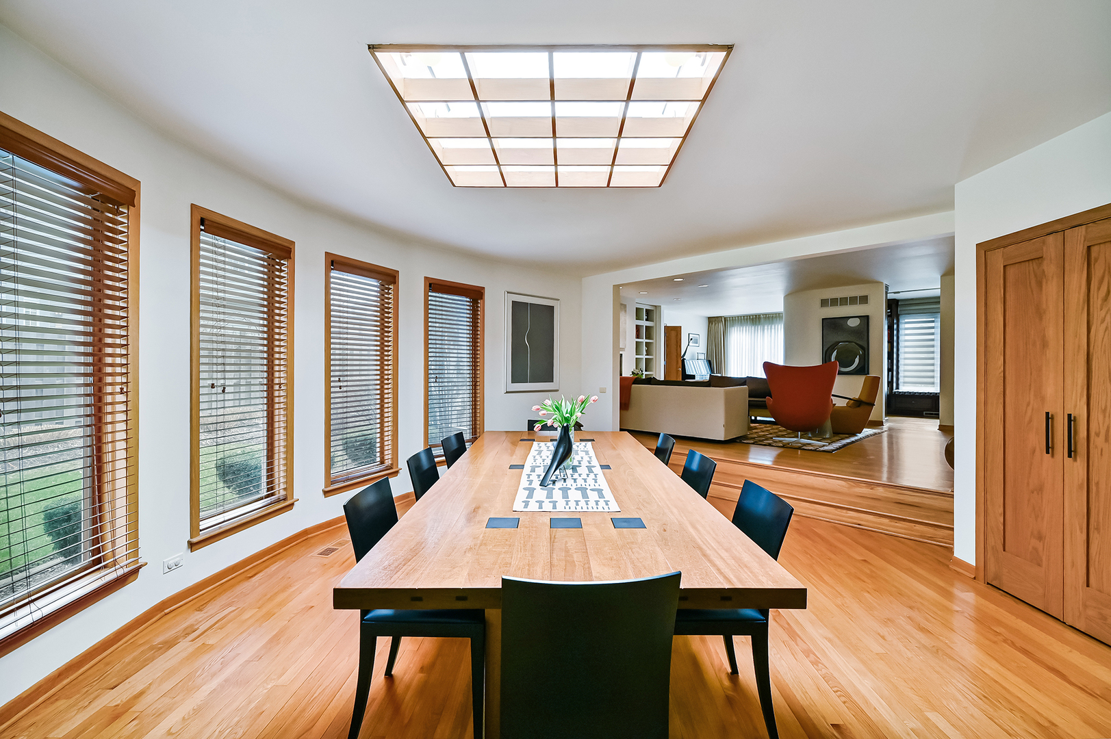 401 8th Place Hinsdale, IL 60521 - Photo 14 of 46 a view of a dining room with furniture window and wooden floor