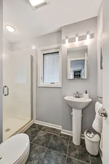a room with a table and chairs