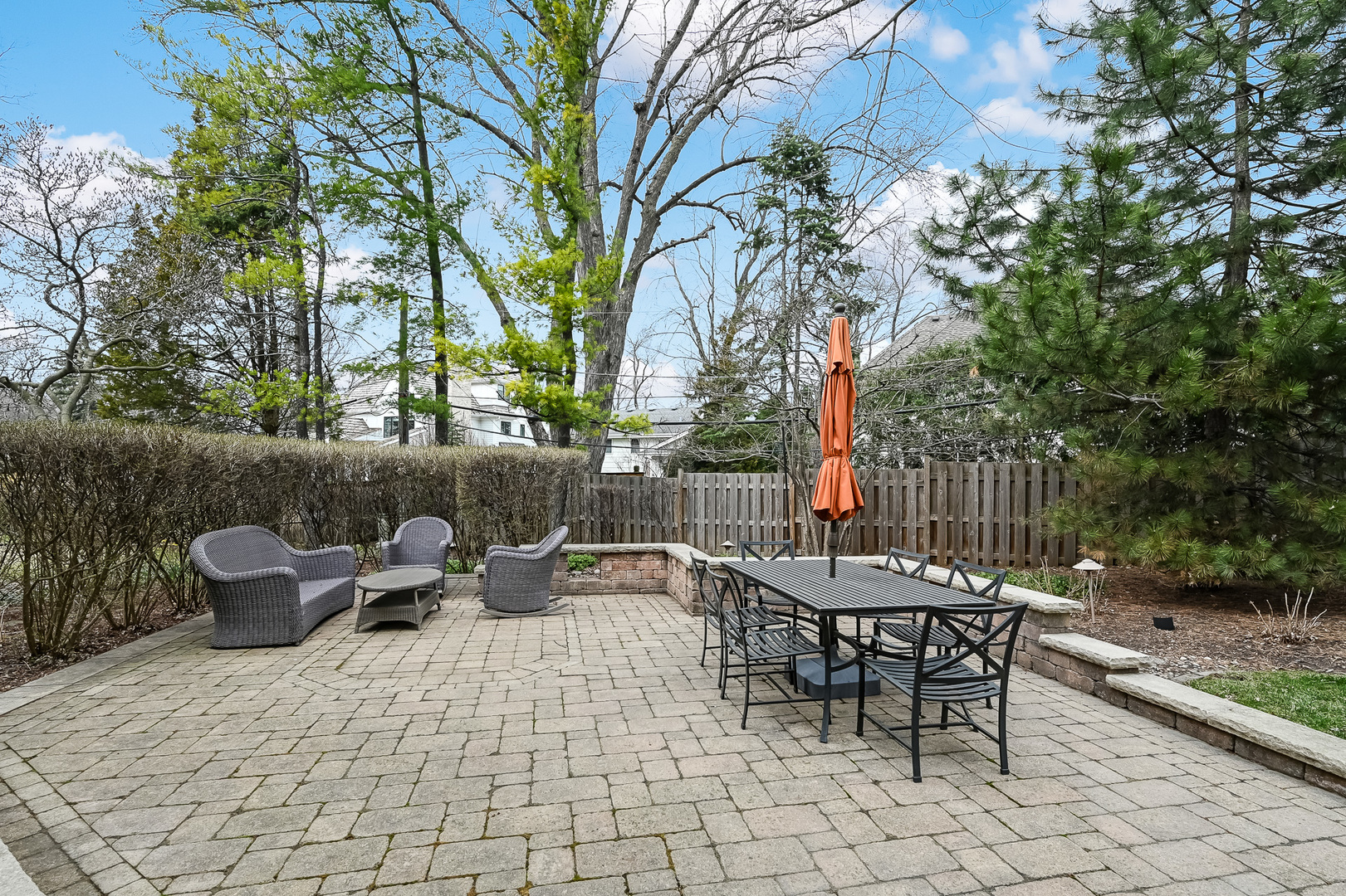 401 8th Place Hinsdale, IL 60521 - Photo 44 of 46 a backyard of a house with table and chairs