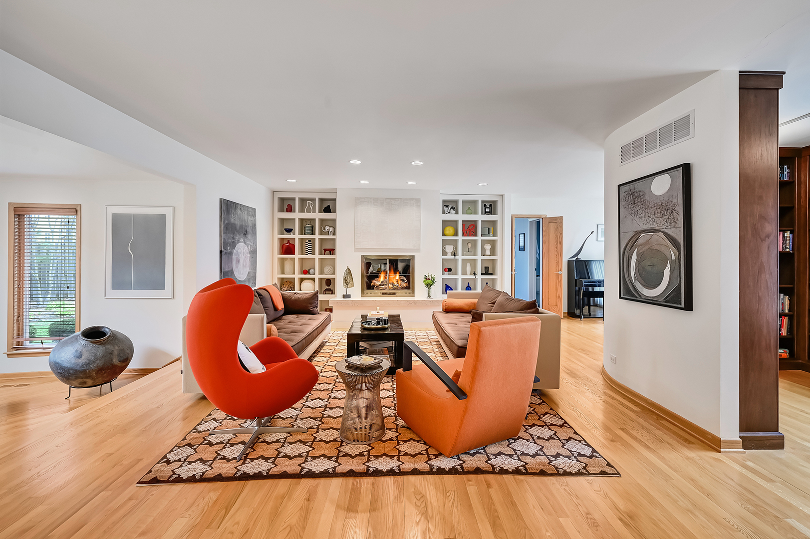 401 8th Place Hinsdale, IL 60521 - Photo 6 of 46 a living room with furniture a wooden floor and a window