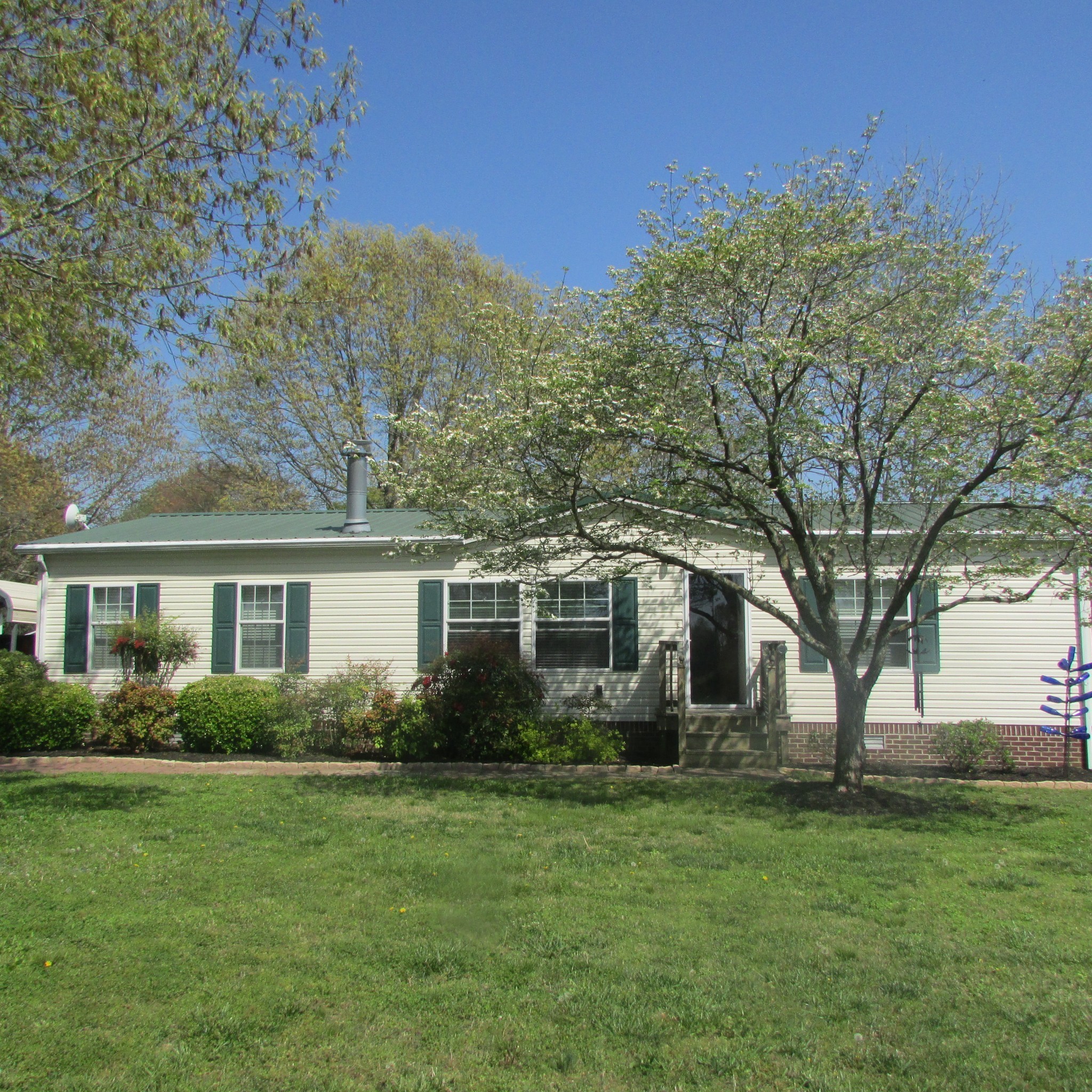 75 Snell Road Ethridge, TN 38456 - Photo 1 of 51 a front view of house with yard and green space
