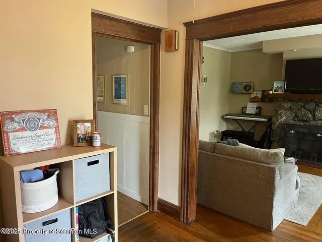 a living room with a couch and a flat screen tv