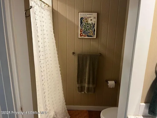 a door with a shower curtain